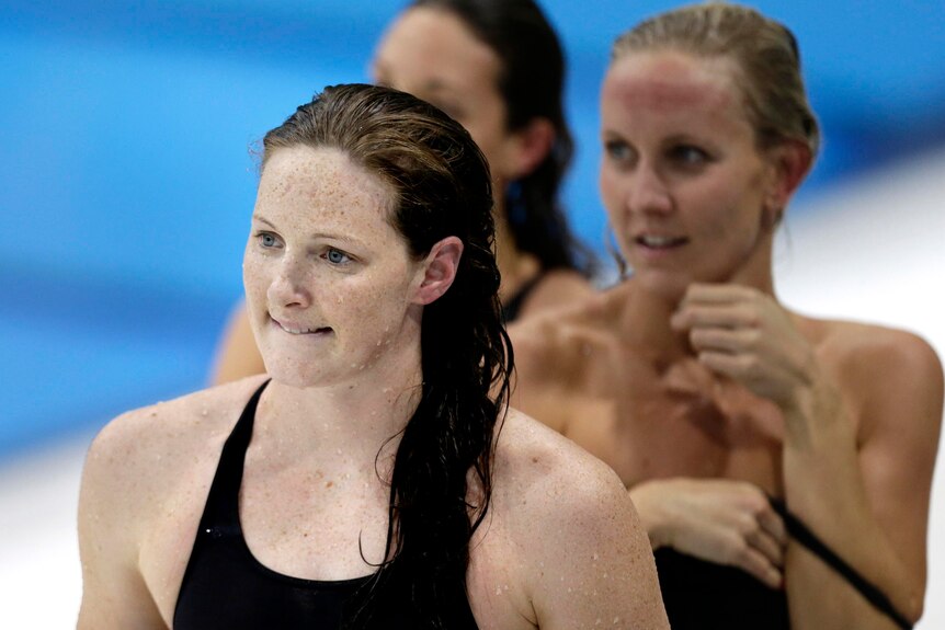 Disappointment ... Australia's Cate Campbell leaves the pool deck after her 50m freestyle semi-final.