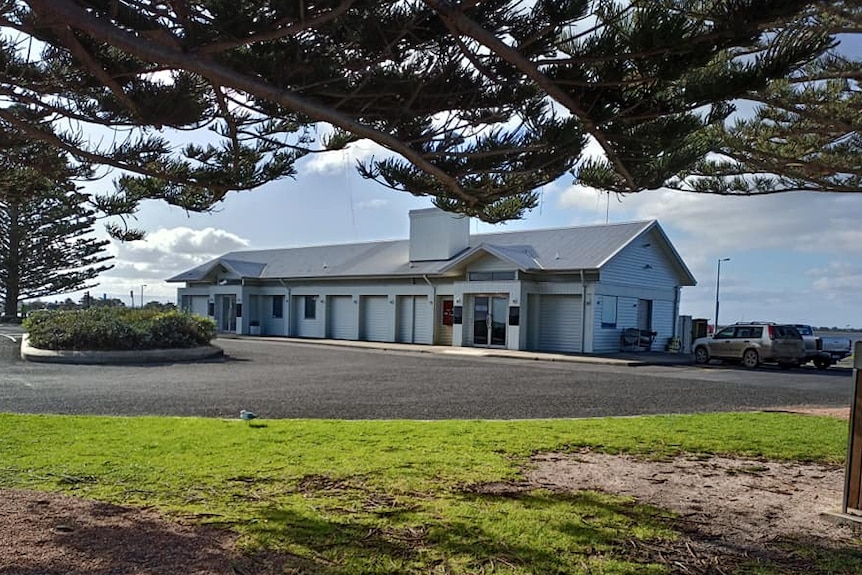 A coastal white building.