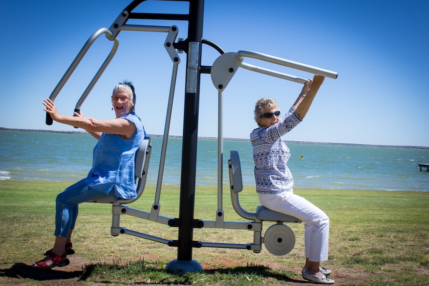 Sheona Boase and Margaret Drogemuller work out on the exercise equipment on the Lake Bonney foreshore.