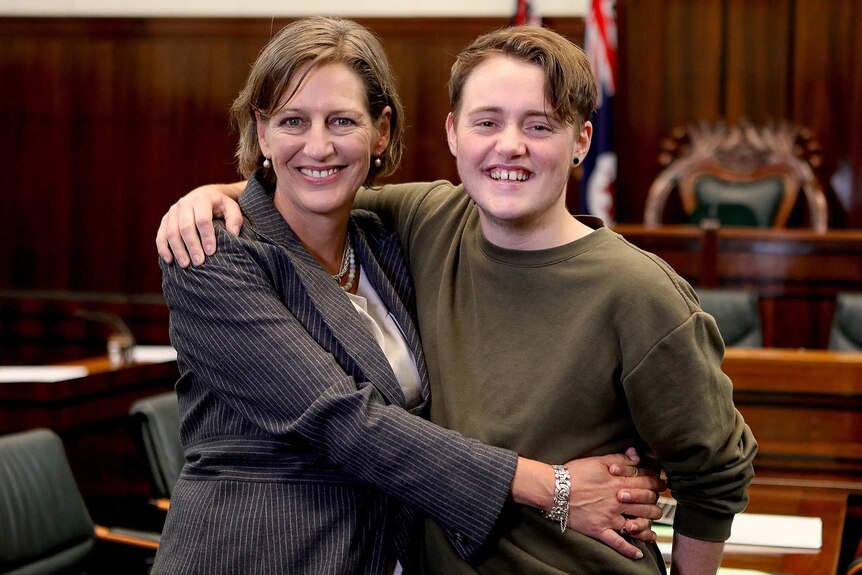 Tasmanian Greens leader Cassy O'Connor and son Jasper, Parliament House.