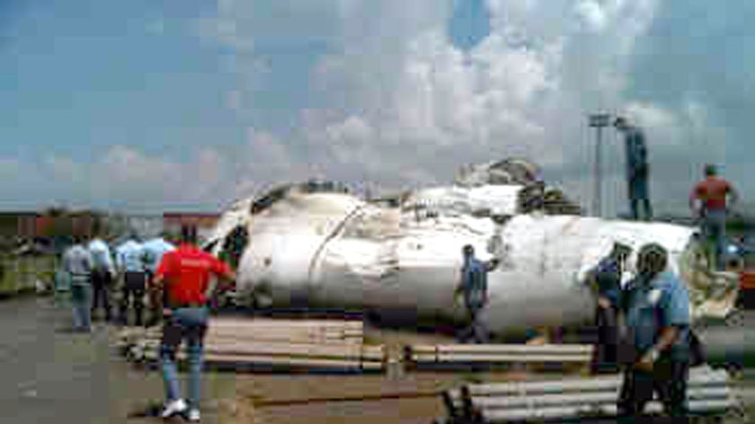 Rescue teams work at the site where an ATR-42 plane crashed in Puerto Ordaz, Venezuela.
