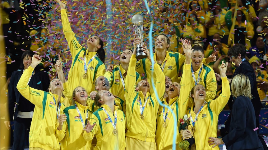 The Diamonds celebrate with the World Cup trophy