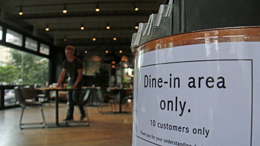 A sign in a restaurant.