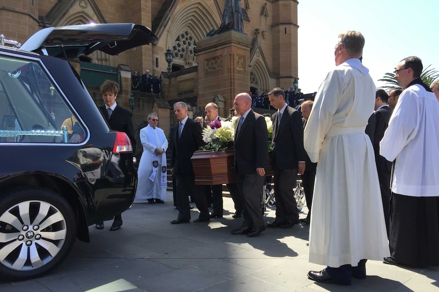 Casket of Curtis Cheng outside St Mary's Cathedral