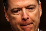 A close up photo of James Comey looking pensive during the testimony.