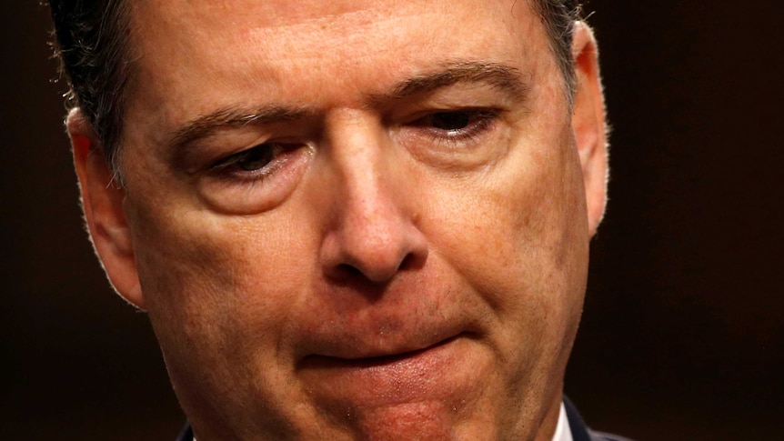 A close up photo of James Comey looking pensive during the testimony.