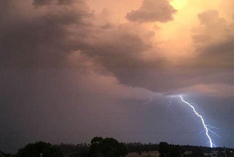 A bolt of lightning hits as the electrical storm moves towards the east coast of Tasmania.