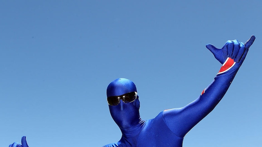 A beachgoer poses during Australia Day celebrations. (Paul Kane: Getty)