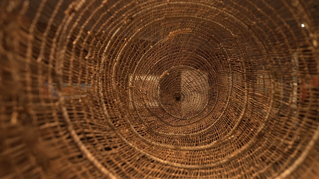 A picture of the inside of a woven basket.