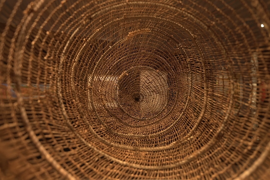 A photo of the inside of a woven basket.