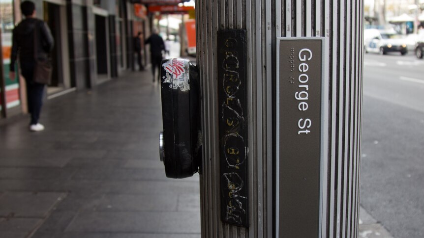 New Braille tactile street signs George St