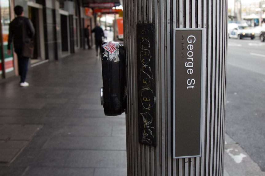 New Braille tactile street signs George St