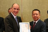 Minmetals Chairman Zhou Zhongshu and Stuart Robert, Assistant Minister of Australian Department of Defence