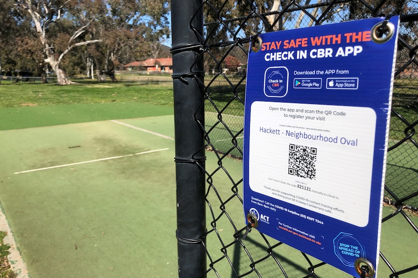 A photo of tennis courts with a QR code used to register for the tour