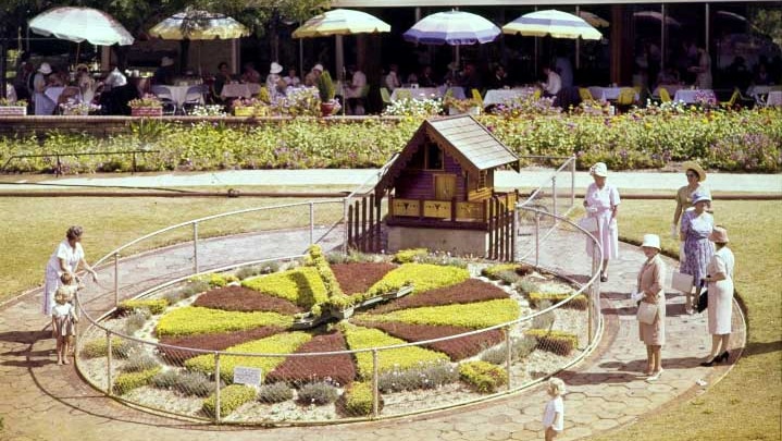 Group of women and children at the floral clock outside Kings Park Garden Restaurant c1962.