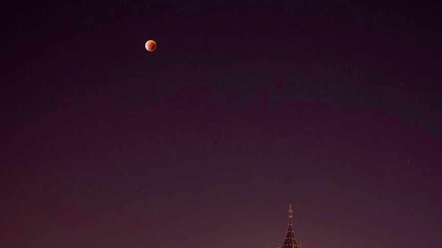A total supermoon lunar eclipse above London's Big Ben