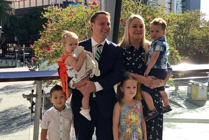 Family posing together for a photo