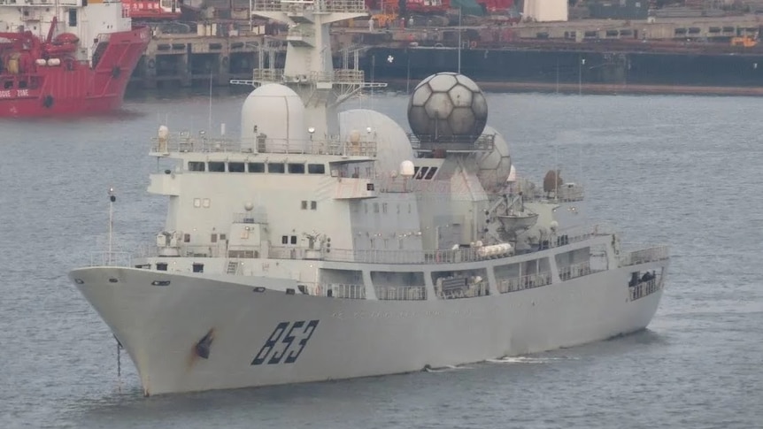 A Chinese AGI spy ship floats in a harbour