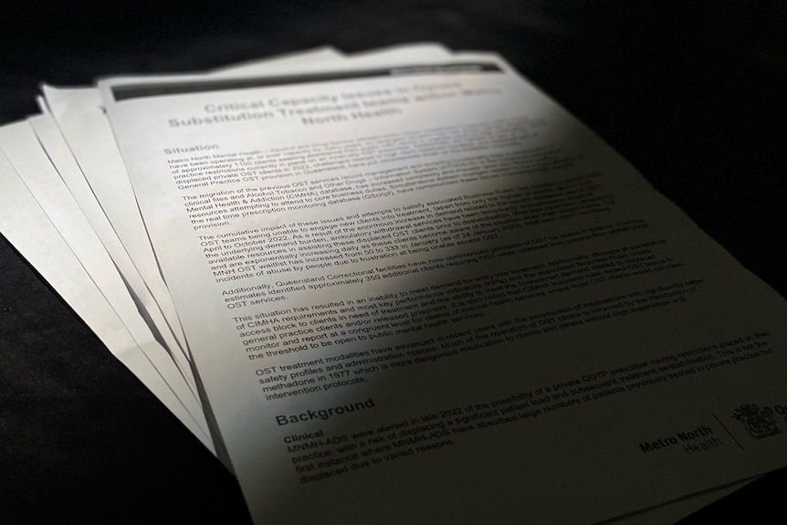 Report titled 'Critical capacity issues in Opioid Substitution Treatment teams within Metro North Health', black on either side
