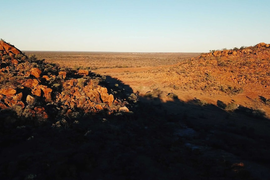 A scenic landscape shot of rocky outcrops.