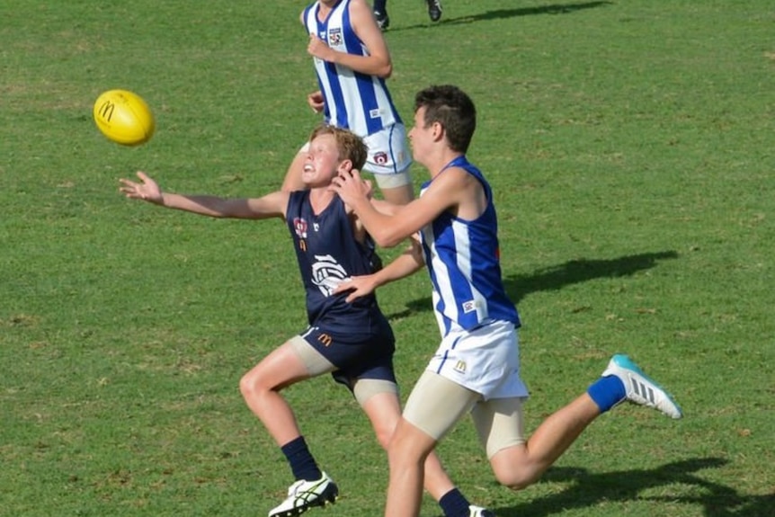 jaspa fletcher as a child playing local afl for coorparoo