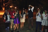 Unidentifiable university students taking part in pub golf.