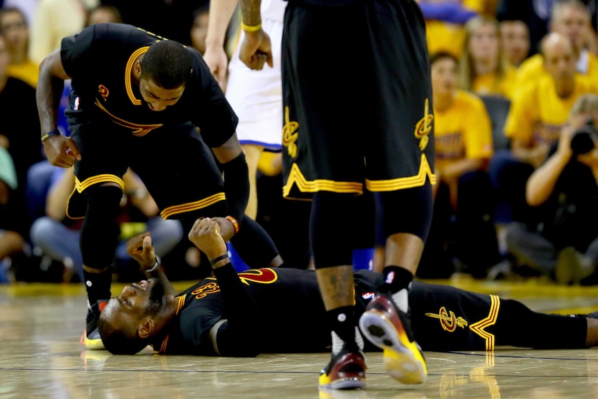 Kyrie Irving and LeBron James celebrate game five NBA Finals win