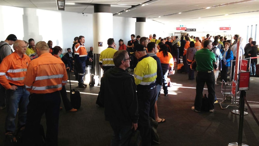 FIFO workers and others wait at Perth airport