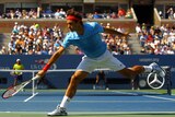 Federer waltzes into the fourth round