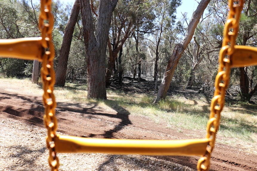 Play equipment right next to charred bushland