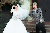 Marilyn adjusts Audra's wedding veil
