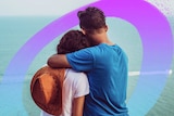 A man and a woman embrace while looking out to sea for a story about how to support someone when they're anxious.