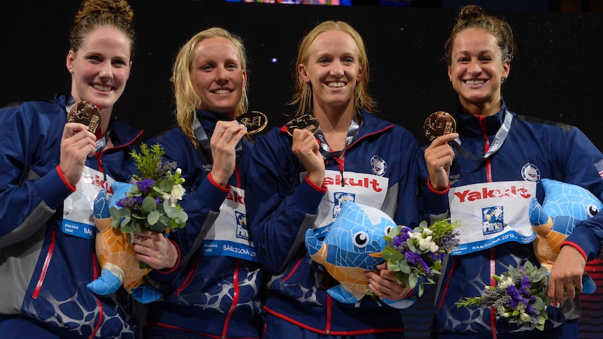 Missy Franklin and the US relay team with their gold medal in Barcelona