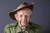 Portrait of an elderly man wearing war medals and army uniform