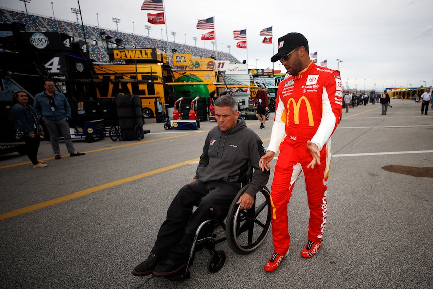 Bootie Barker next to Bubba Wallace