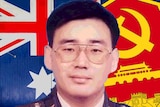 Yang in military uniform with the Australian flag and Chinese MSS symbol.
