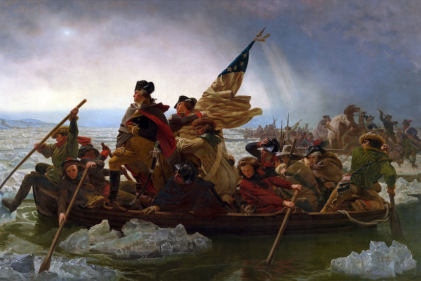 George Washington stands at the helm of a boat of soldiers.