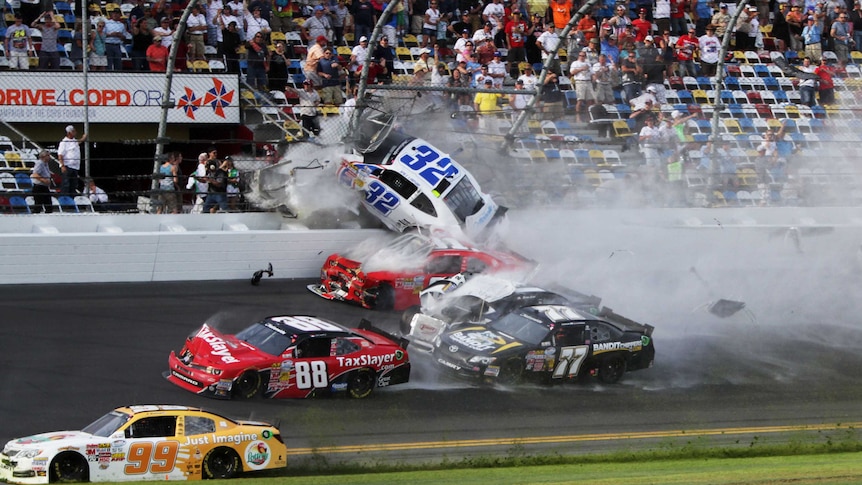 Car crashes into safety fencing at NASCAR race at Daytona