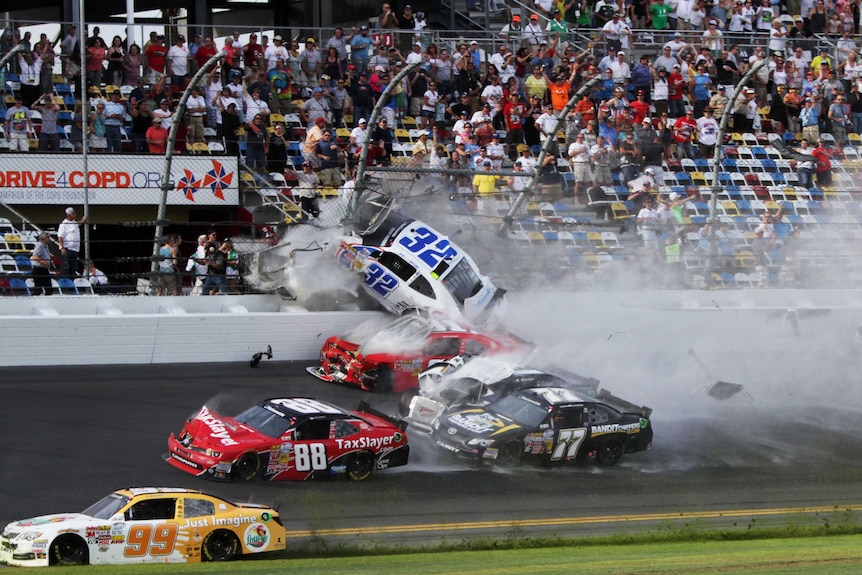 Car crashes into safety fencing at NASCAR race at Daytona