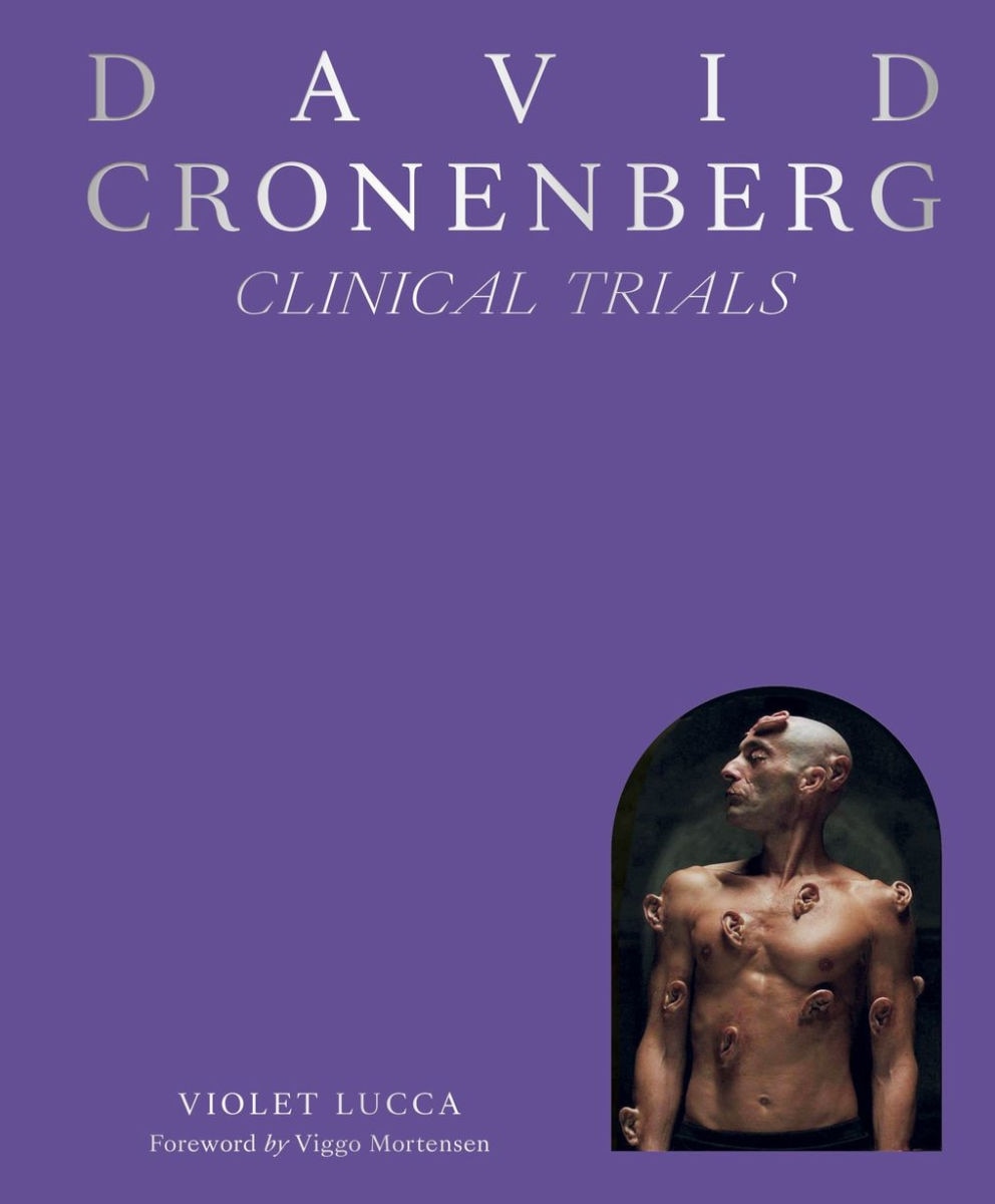 Purple cover with image of man whose naked torso is covered in ears. Text: David Cronenberg: Clinical Trails, Violet Lucca.