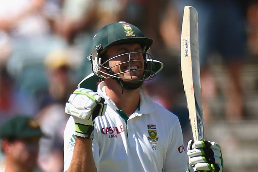 Classy display ... AB de Villiers celebrates after scoring his century
