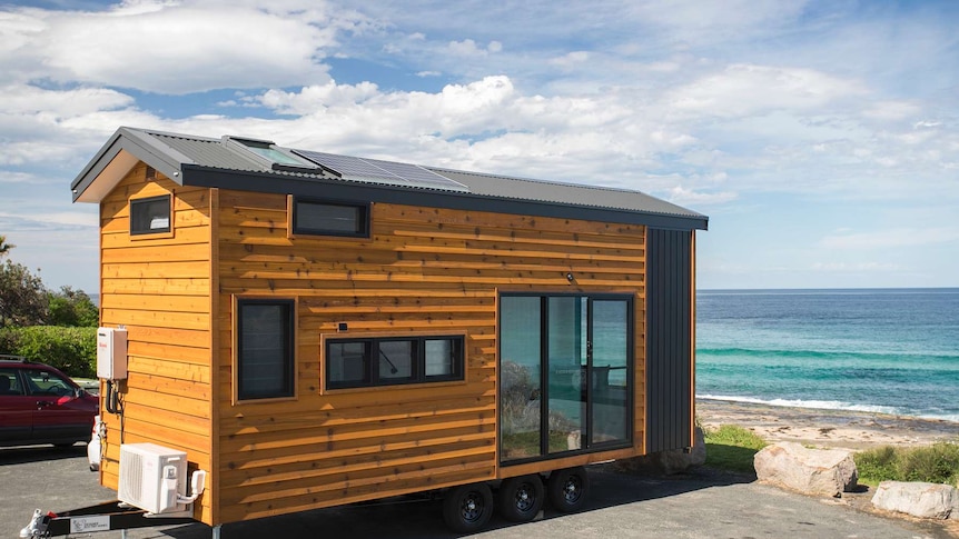 A tiny home parked by the ocean