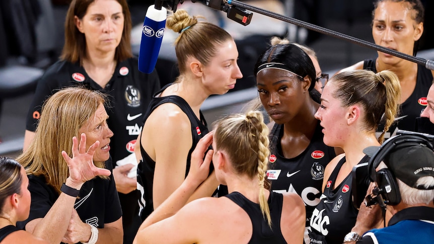 Magpies coach Nicole Richardson gives her team some direction in a huddle