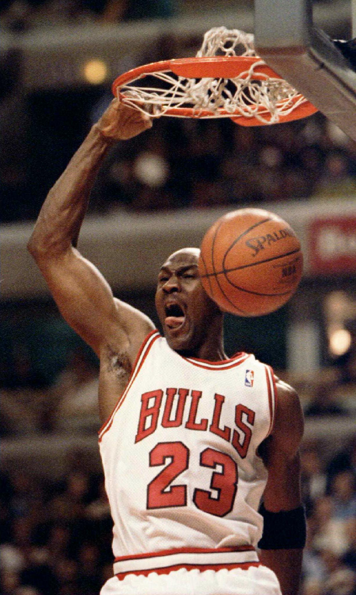 Michael Jordan shooting hoops with Chicago Bulls