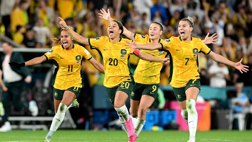Mary Fowler, Sam Kerr, Caitlin Foord and Steph Catley of Australia celebrate the team’s victory
