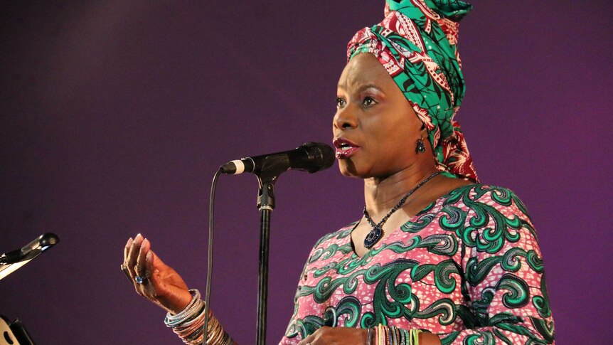 Colourful Angelique Kidjo on stage