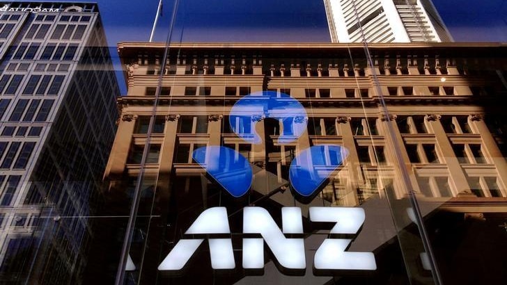 The logo of the ANZ Banking Group is displayed in the window of a newly opened branch in central Sydney