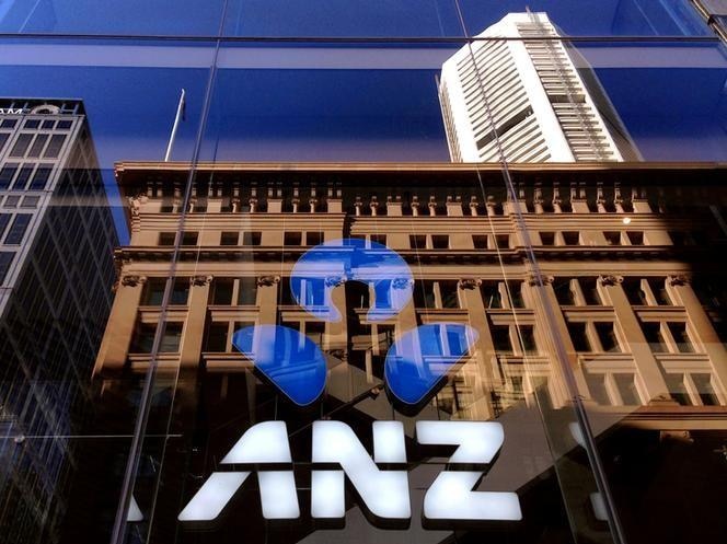 The logo of ANZ Banking Group is displayed in the window of a newly opened branch in central Sydney