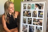 Shirley Benn looks at photos of her dog