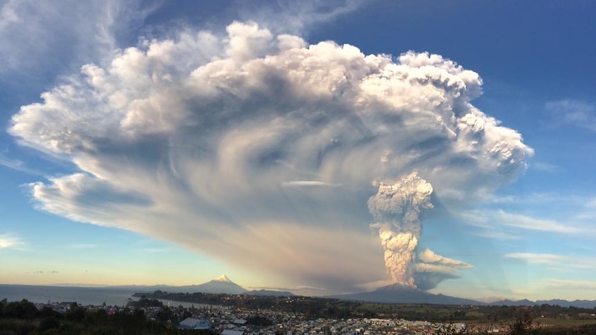 A huge cloud rise out of a volcano.